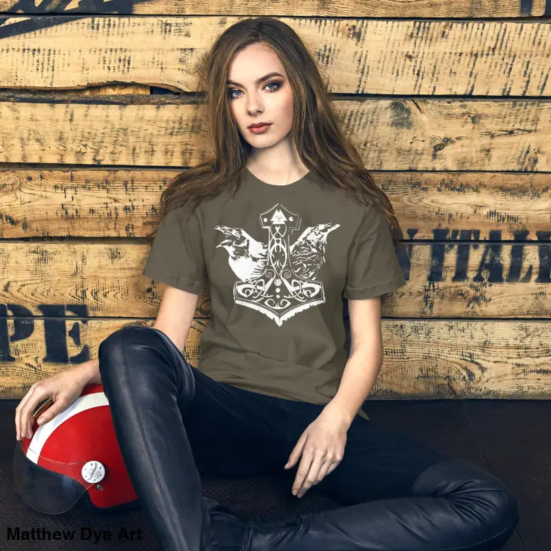 Woman wearing Odin’s Chosen Tee featuring Thor’s Hammer design in Norse art style