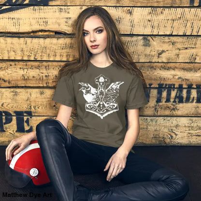 Woman wearing Odin’s Chosen Tee featuring Thor’s Hammer design in Norse art style