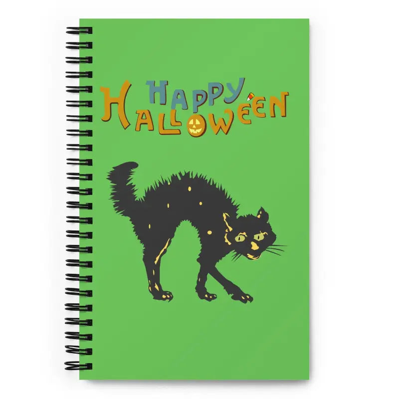 Green Halloween spiral notebook featuring scary cat design and colorful Happy Halloween text