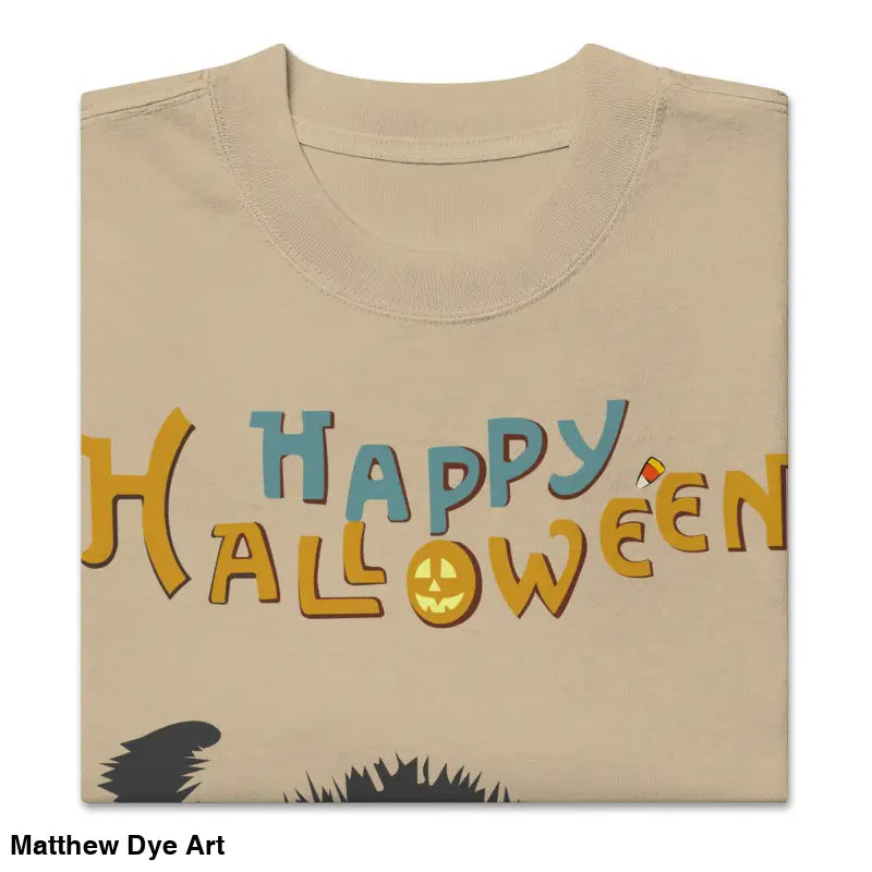 Folded beige t-shirt featuring Scary Cat Halloween design in oversized style