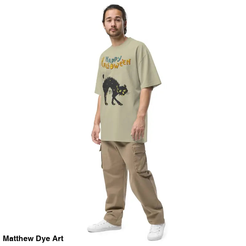 Man wearing Scary Cat Halloween oversized faded t-shirt and cargo pants
