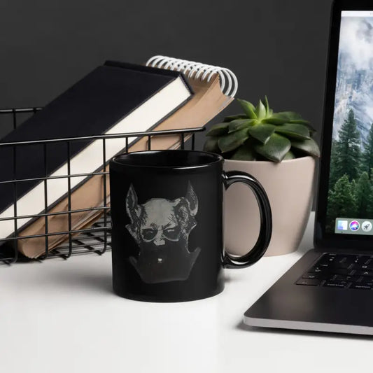 Elegant black glossy mug with skull design perfect for morning java or afternoon tea