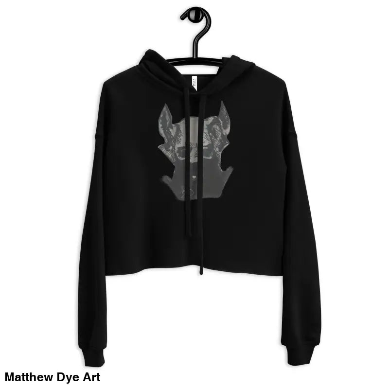 Black cropped hoodie featuring sinister figure design and dropped shoulder cut