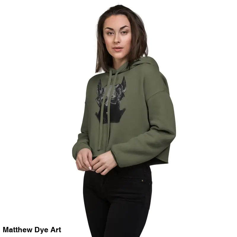 Olive green cropped hoodie featuring sinister figure design and exaggerated pointed ears