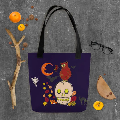 Purple tote bag with Halloween artwork featuring skull, owl, ghost, and autumn leaves