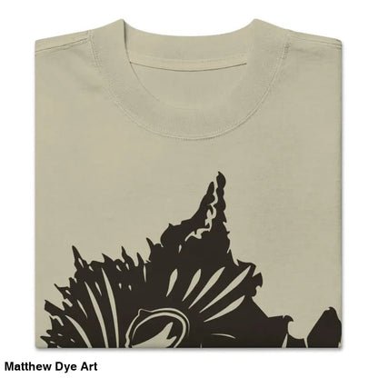 Folded beige oversized faded t-shirt featuring dark floral design from Snarling Nightmare