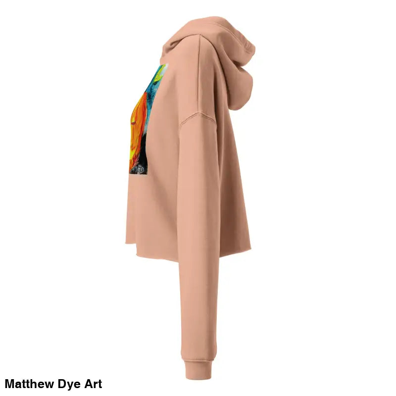 Peach-colored cropped hoodie featuring a Spooky Cute Jack-o’-Lantern design by Matthew Dye Art
