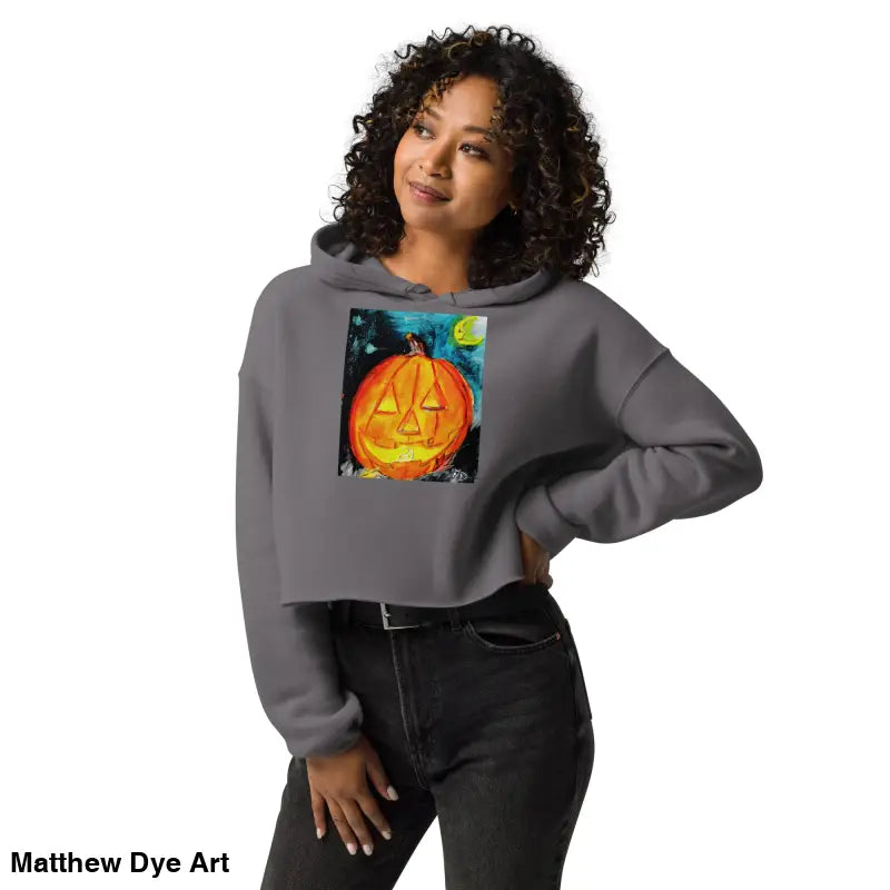 Gray cropped hoodie featuring a spooky cute jack-o’-lantern design by Matthew Dye Art
