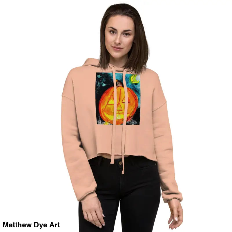 Peach cropped hoodie featuring Spooky Cute pumpkin graphic by Matthew Dye Art