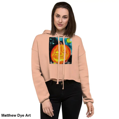 Peach cropped hoodie featuring Spooky Cute pumpkin graphic by Matthew Dye Art