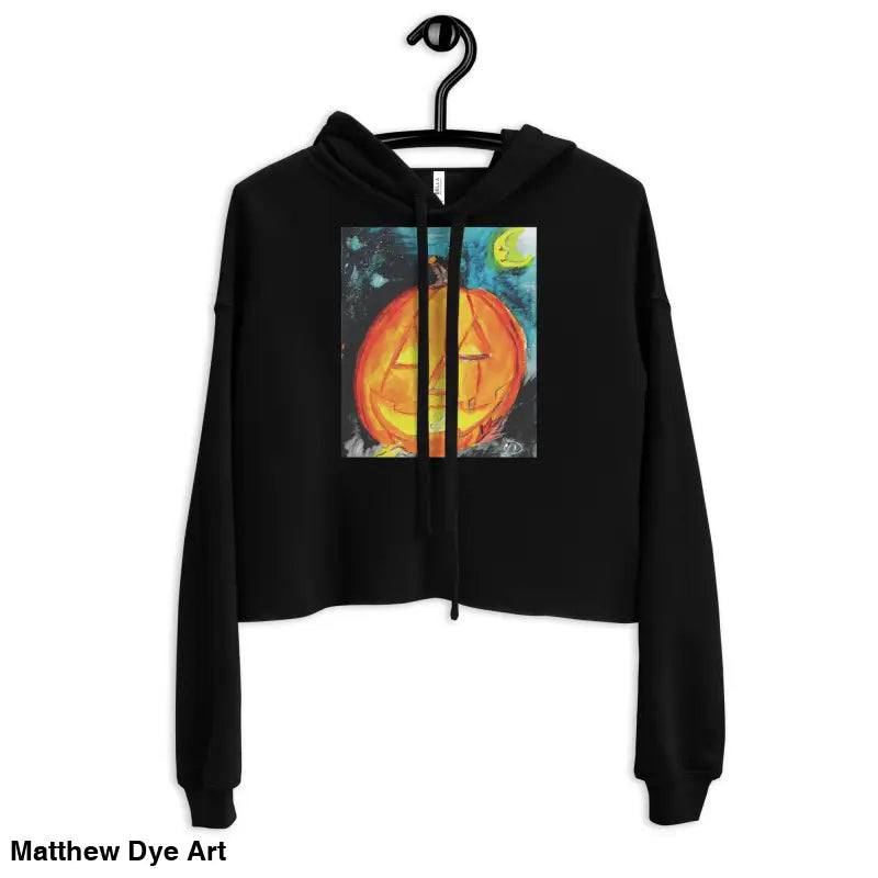 Black cropped hoodie featuring spooky cute pumpkin graphic by Matthew Dye Art