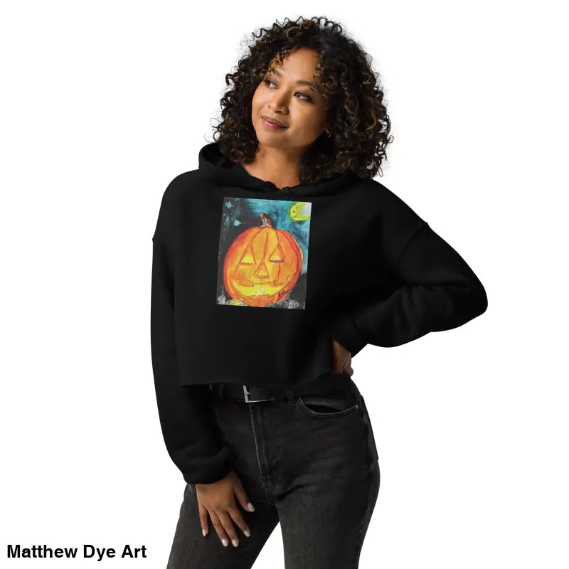 Black cropped hoodie featuring spooky cute pumpkin graphic by Matthew Dye Art