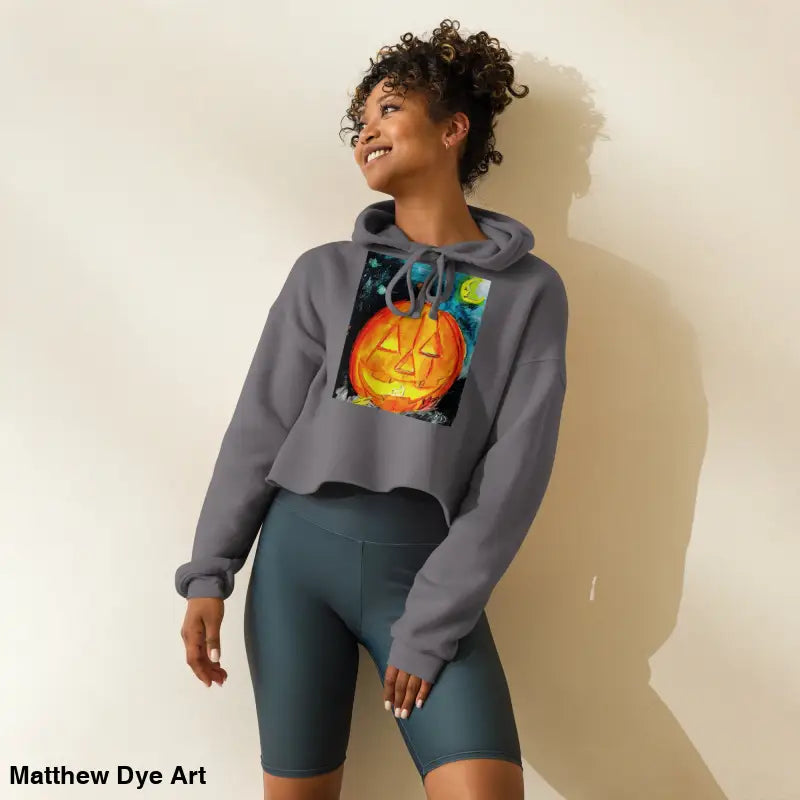 Gray cropped hoodie featuring a spooky cute pumpkin graphic by Matthew Dye Art