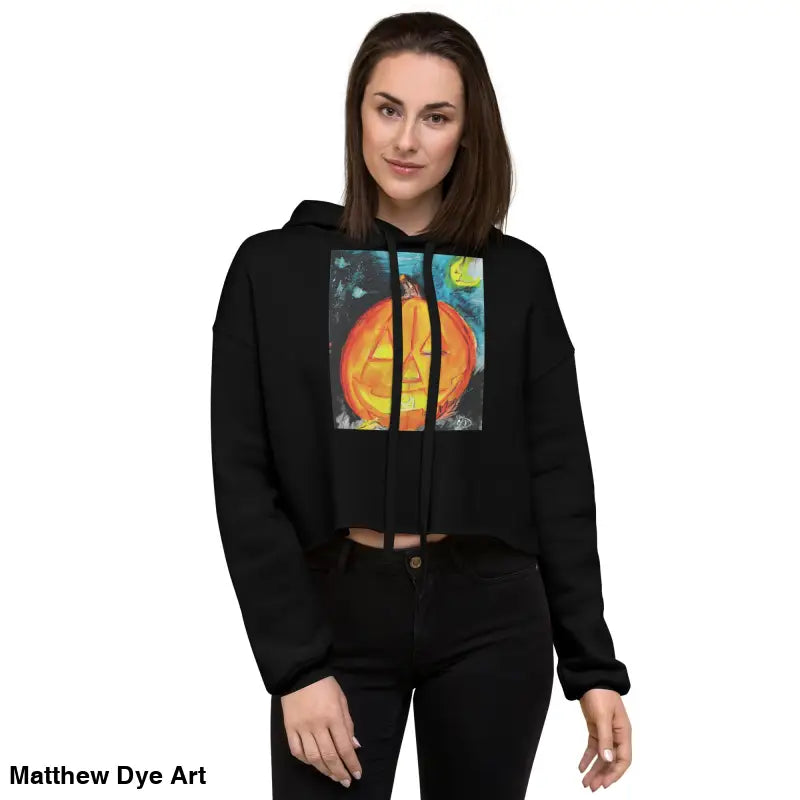 Black cropped hoodie featuring Spooky Cute Jack-o’-lantern design by Matthew Dye Art