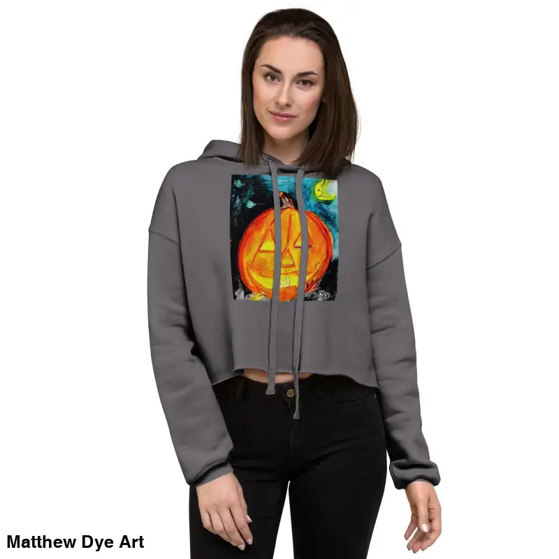 Gray cropped hoodie featuring a Spooky Cute jack-o’-lantern design by Matthew Dye Art