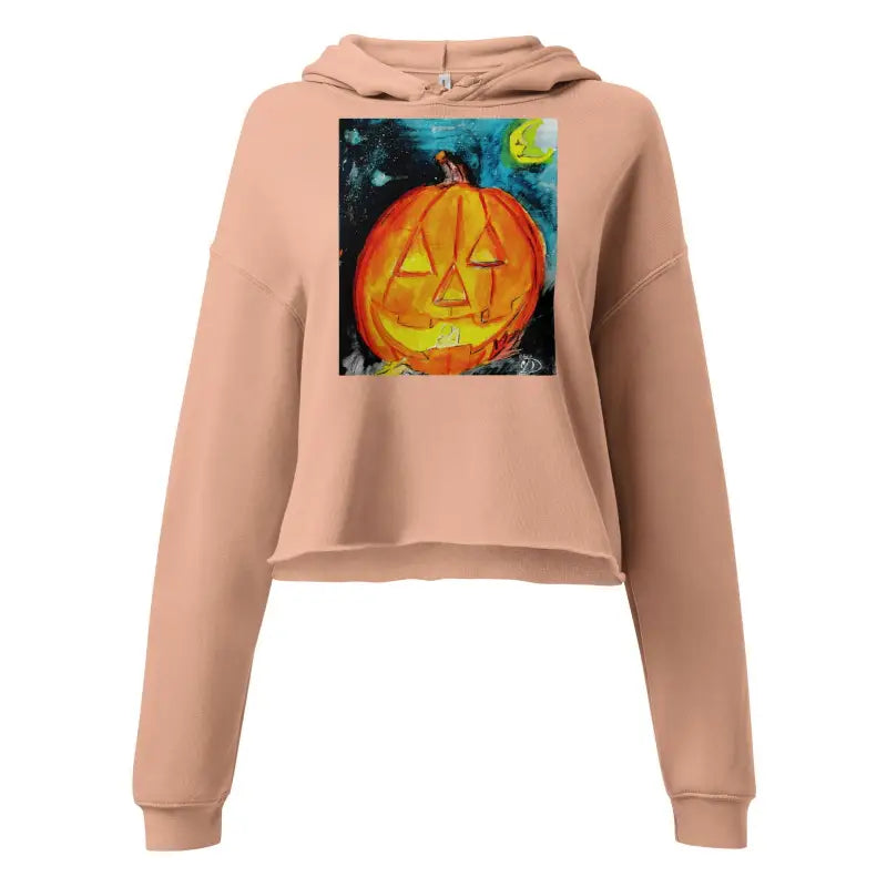 Peach crop hoodie with Halloween designs featuring a whimsical jack-o’-lantern