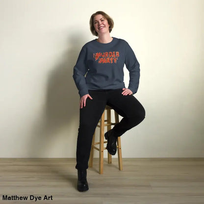 Woman wearing an eco-friendly Murder Party sweatshirt, showcasing horror art style