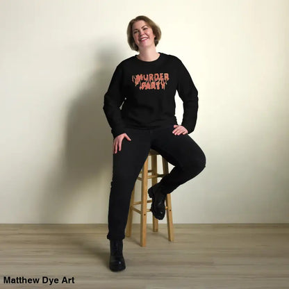 Woman wearing eco-friendly Murder Party sweatshirt and pants in black attire