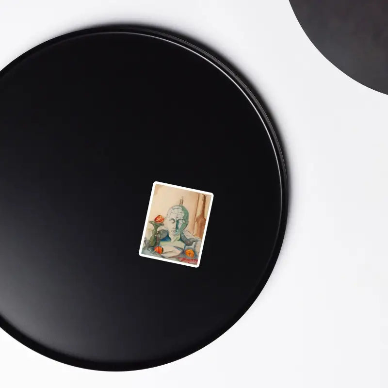 Black circular disc with vintage card showcasing Stillness of Phrenology Premium Magnet Set