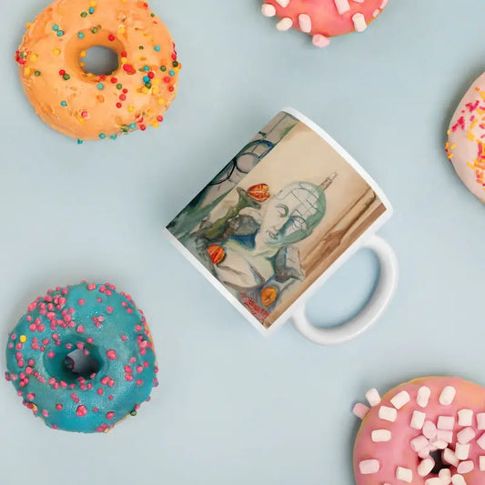 Colorful frosted donuts surround a glossy mug crafted with Matthew Dye art