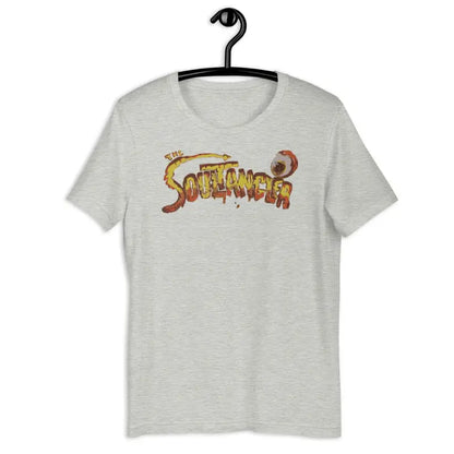 White comfortable unisex t-shirt with Sojourner text in decorative orange and red on hanger