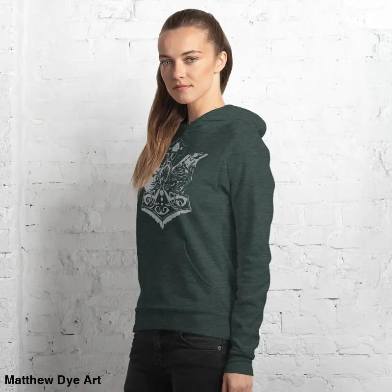 Green Viking unisex pullover hoodie featuring Thor’s Mjolnir and Odin’s Ravens design