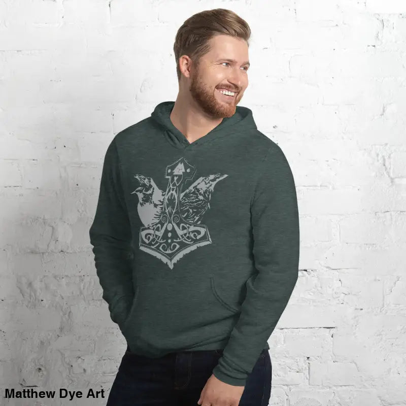 Green hoodie featuring Thor’s Mjolnir and Odin’s Ravens in a comfortable Viking design