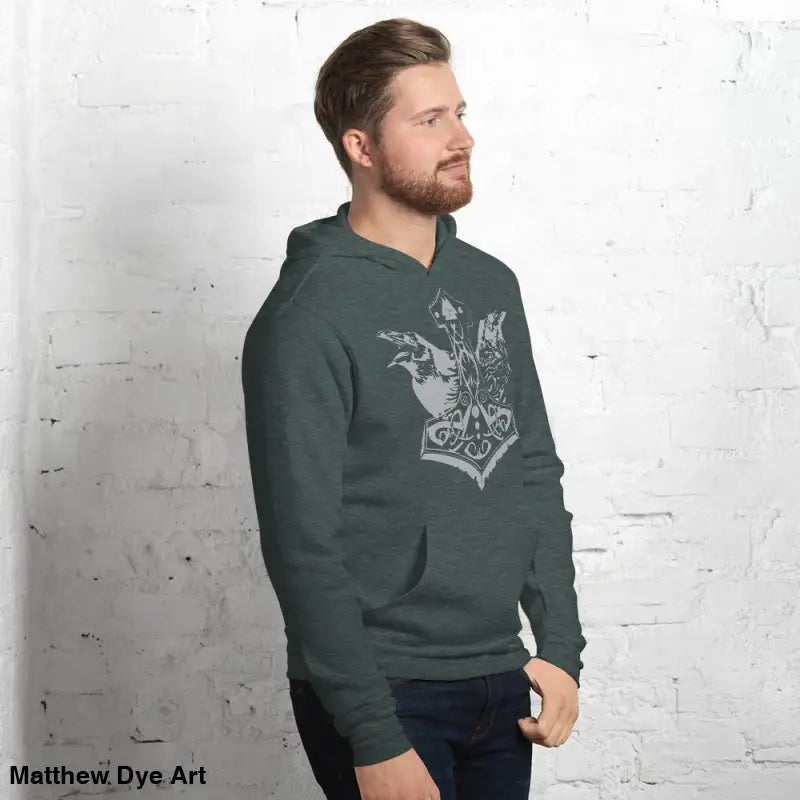 Green hoodie featuring Thor’s Mjolnir and Odin’s Ravens design, a comfortable Viking unisex pullover