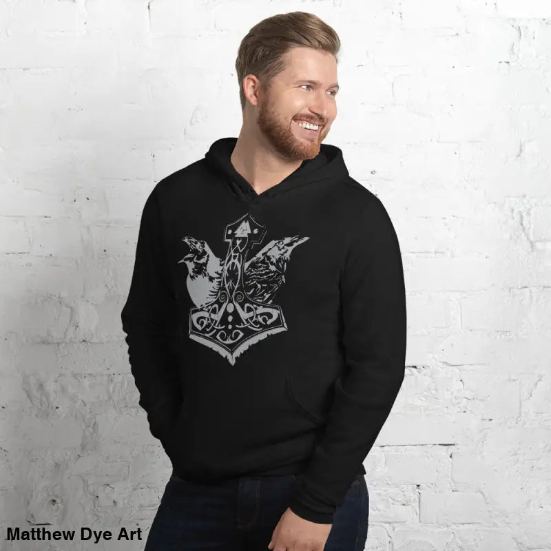 Black hoodie featuring Thor’s Mjolnir and Odin’s Ravens, a comfortable Viking unisex pullover