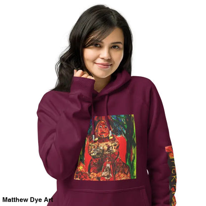 Burgundy hoodie featuring Matthew Dye art in colorful Trick ’r Treat Halloween designs