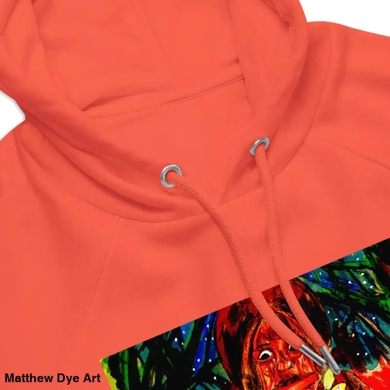 Coral-colored hooded sweatshirt featuring Matthew Dye art and Halloween designs from Trick r Treat