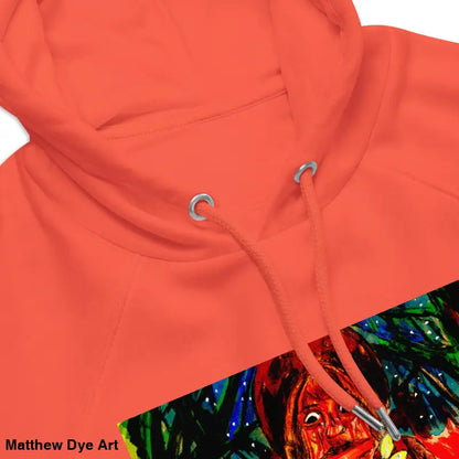 Coral-colored hooded sweatshirt featuring Matthew Dye art and Halloween designs from Trick r Treat