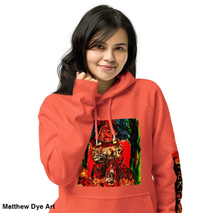 Coral-colored hoodie with graphic print by Matthew Dye art featuring Trick ’r Treat Halloween designs