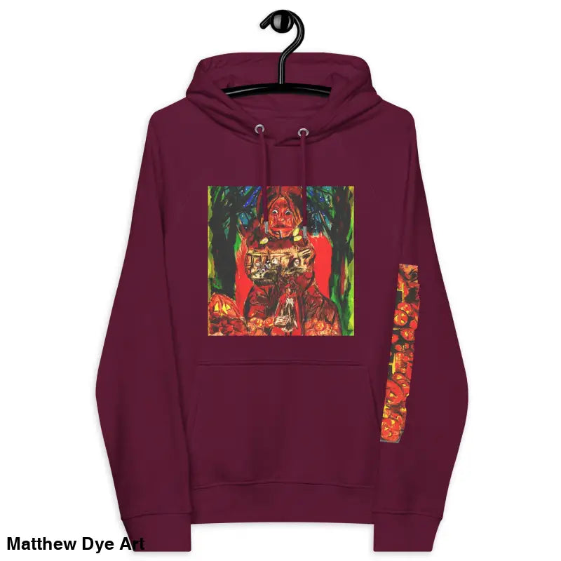 Maroon hoodie featuring Matthew Dye art with colorful Trick r Treat Halloween designs