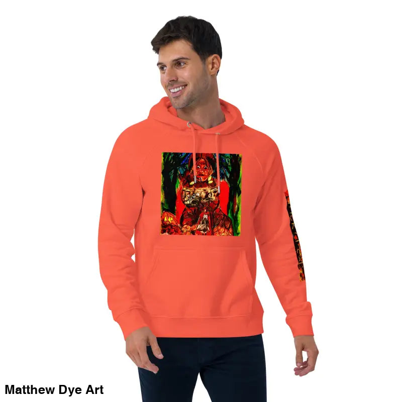 Orange hoodie featuring colorful Matthew Dye art inspired by Trick ’r Treat Halloween designs