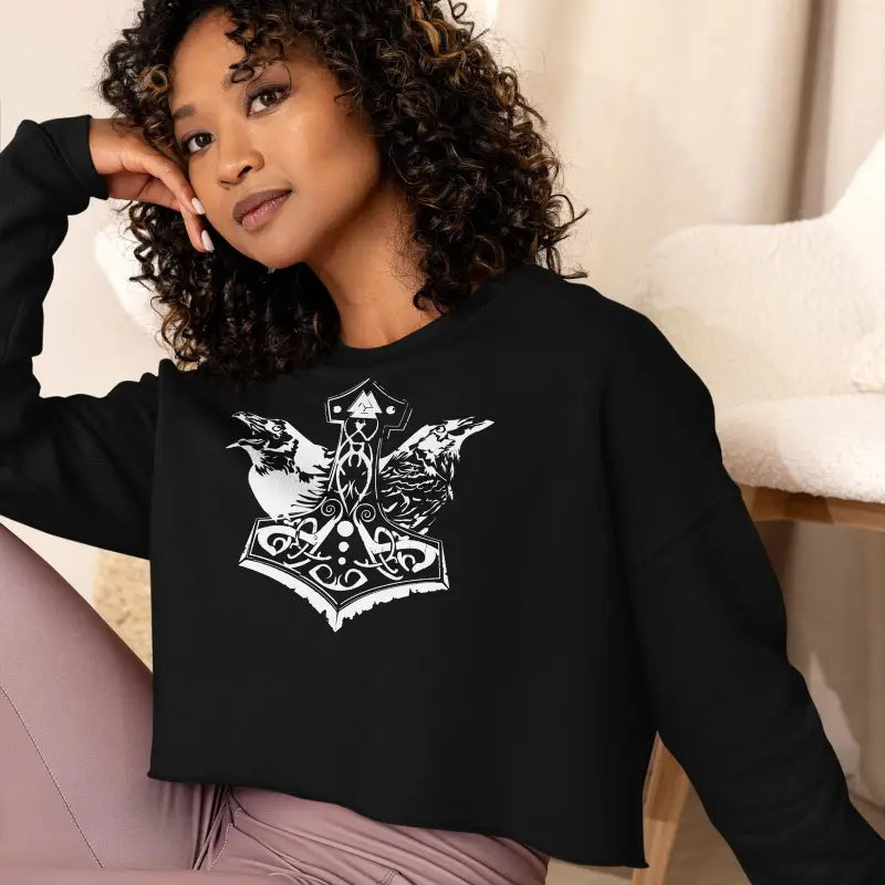 Black cropped sweatshirt with white Norse-style hammer design for Valkyrie Spirit Cropped