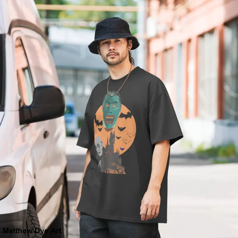 Man wearing oversized unisex faded t-shirt for Halloween in vintage-style design