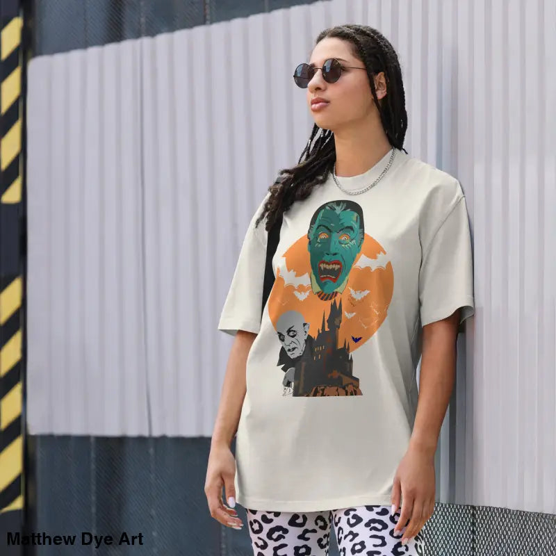 Oversized unisex faded t-shirt featuring vintage-style vampire design for Halloween
