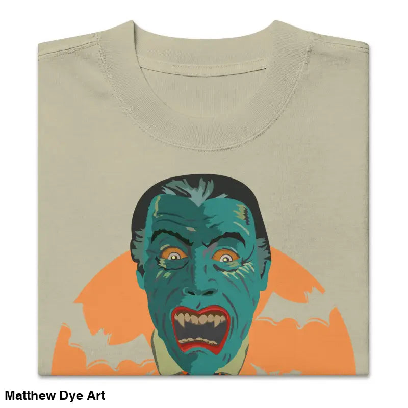 Folded oversized unisex faded t-shirt featuring vampire graphic for Halloween style