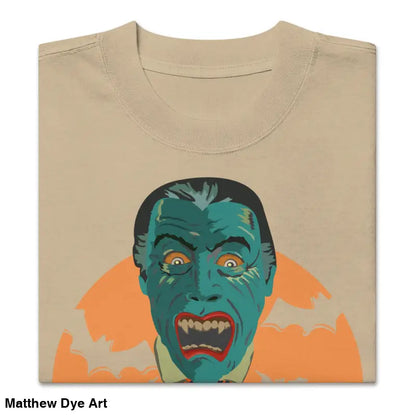 Folded beige oversized unisex faded t-shirt with vintage vampire graphic for Halloween