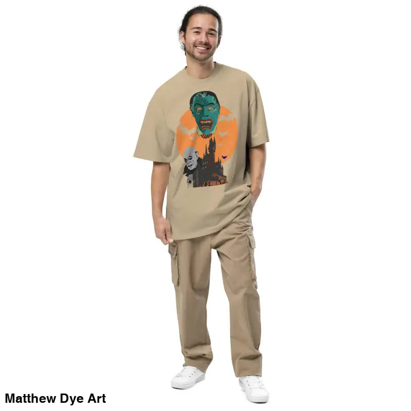 Man showcasing an oversized unisex faded t-shirt for Halloween with cargo pants