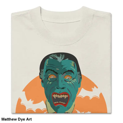 Folded oversized unisex faded t-shirt featuring a vampire graphic for Halloween style