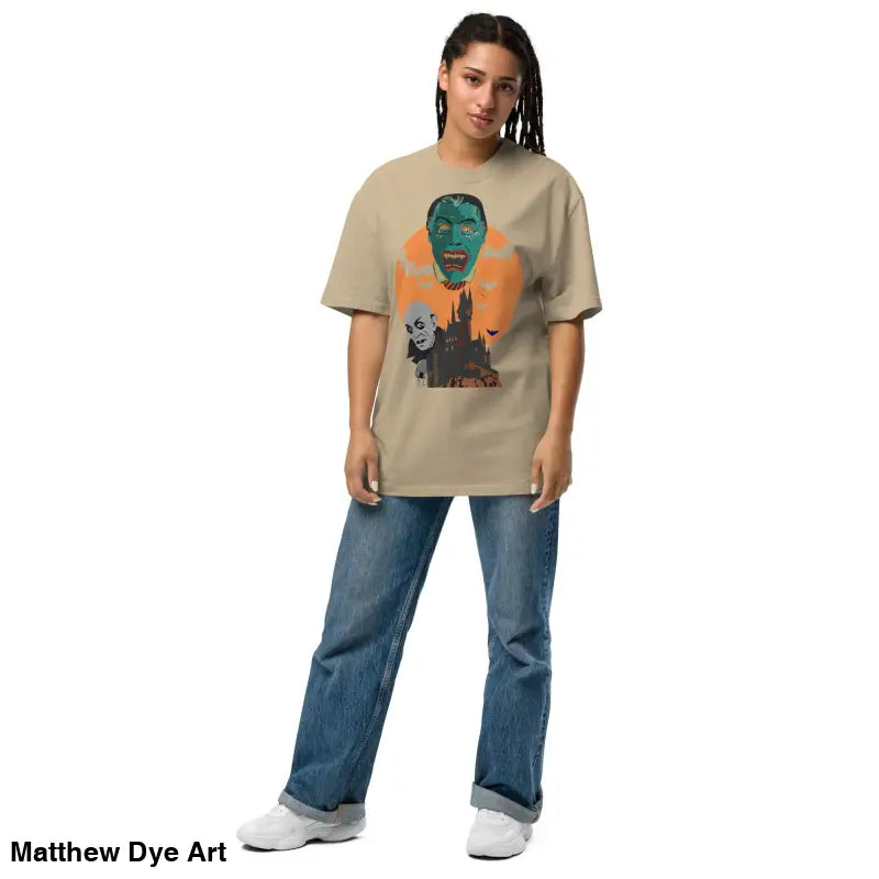 Woman in a graphic oversized unisex faded t-shirt pairs well with jeans for Halloween