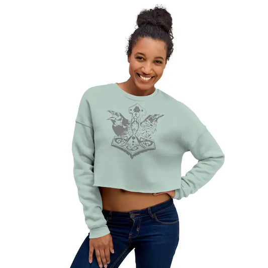 Mint green fleece cropped sweatshirt with decorative anchor design and wings