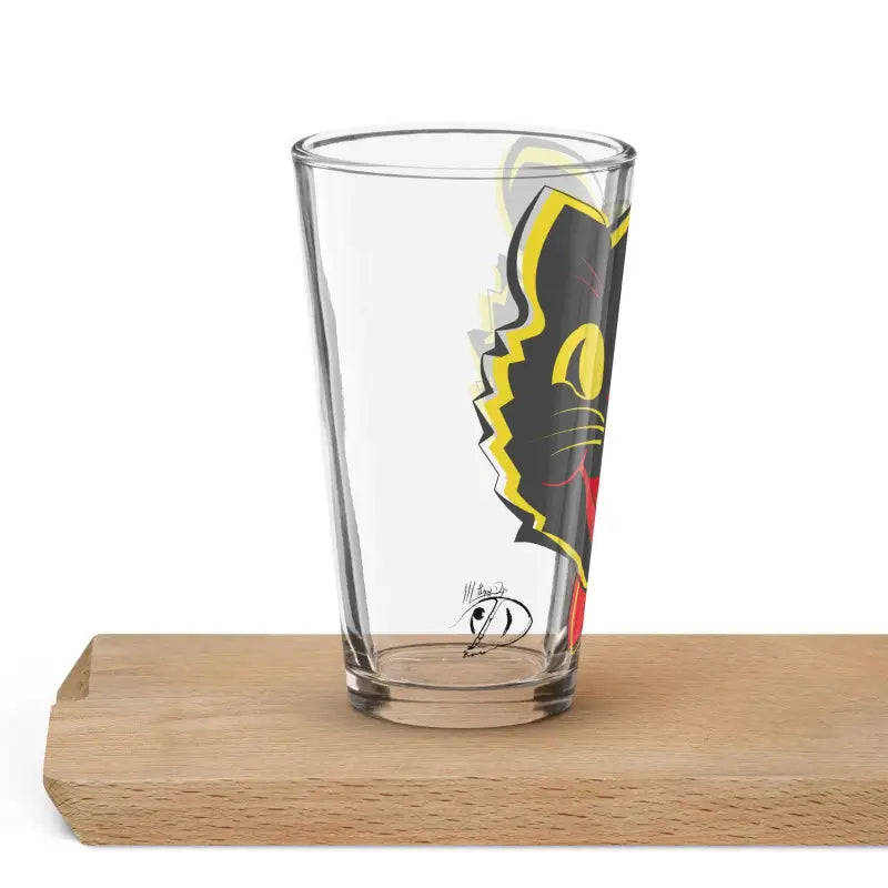 Clear drinking glass featuring a black and yellow cat design, a Vintage Cat Shaker Pint