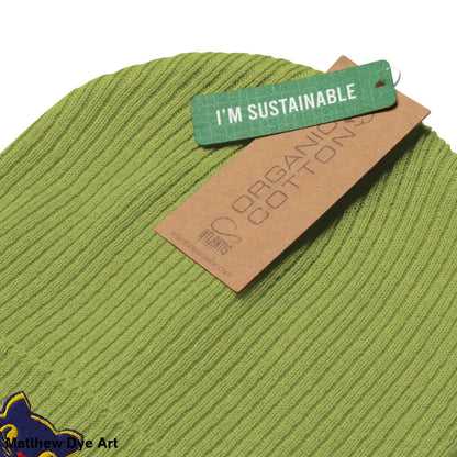 Green knit beanie with tags, featuring a vintage Halloween cat design, organic beanie