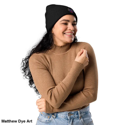 Black knit beanie with embroidered patch, featuring a vintage Halloween cat design