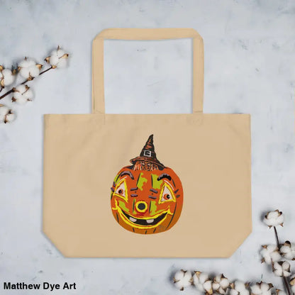 Beige tote bag featuring Vintage Pumpkin Witch design for Halloween trick or treat
