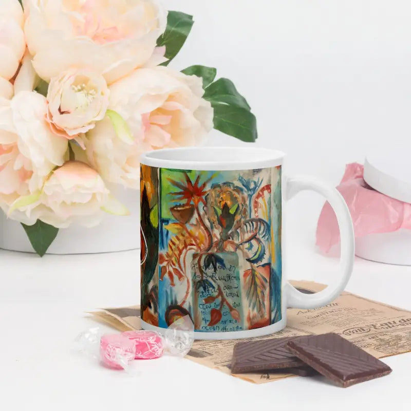 White ceramic mug with vibrant tropical jungle design by Matthew Dye, Voynich Ceramic Mug