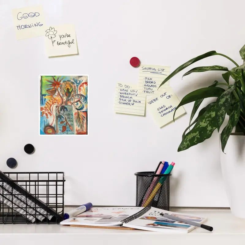 Organized desk workspace with a pen holder, papers, and a potted plant for Magnet Featuring Matthew